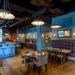 GIK Acoustics Empire State South GIK Acoustics sound absorbing 2 inch acoustic panels helping restaurant acoustics