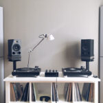 GIK Acoustics TriTrap Corner Bass Traps with turntables and records with speakers